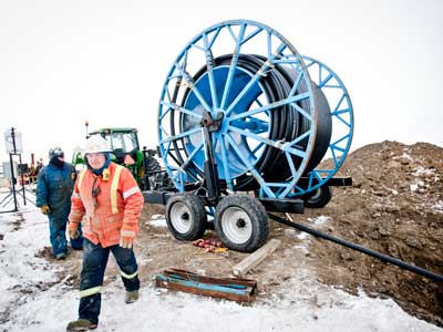Clean Harbors technicians are installing 2-inch HDPE for power